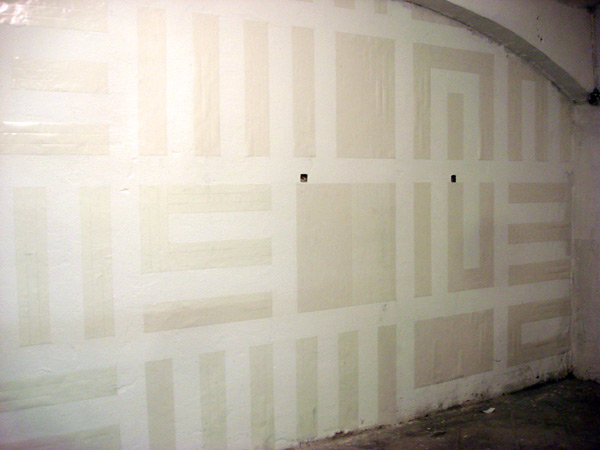 ...with double face tape on a big wall on one of the room of the gallery... ...with double face tape on a big wall on one of the room of the gallery...