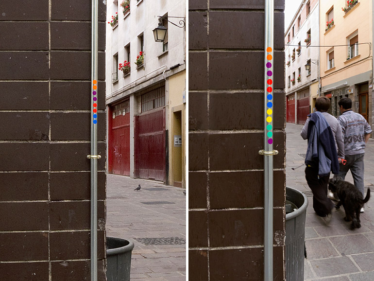 Round stickers in a street corner, each color is a different day. Three of the same color means I passed the spot three times that day.