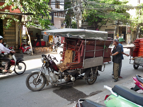 The scaffolding left as it came, by motorbike.